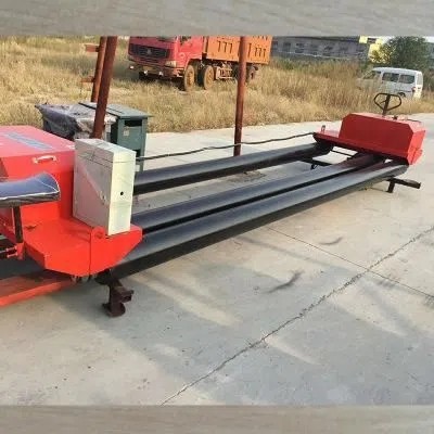 Concrete slip form paving machine